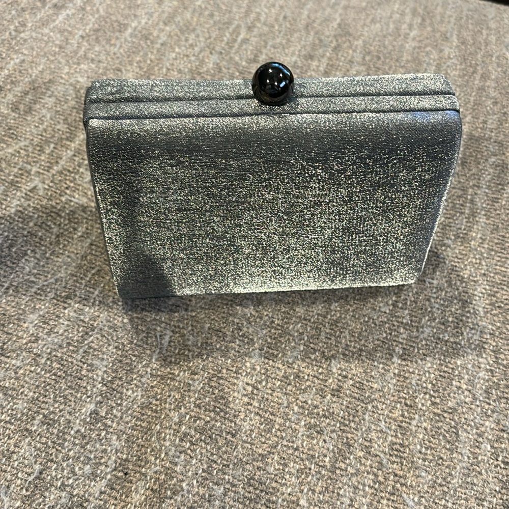Classy evening purse, dark silver, 6’ long, 2’ wide, 4’ deep.